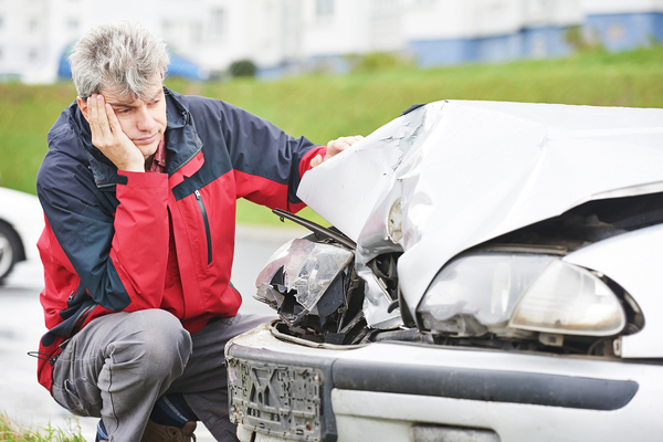 A man distressed after a car accident.