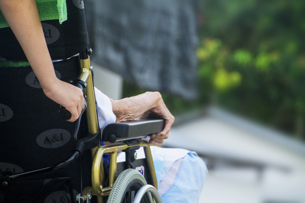 Elder person on a wheelchair.