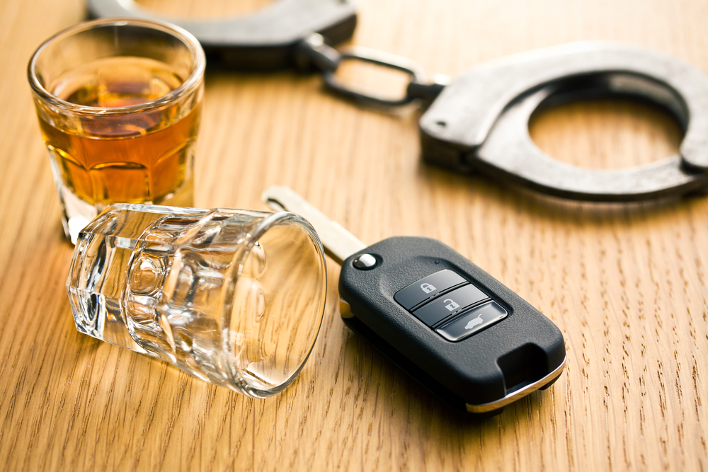 Photo of Liquor Glasses and Car Keys
