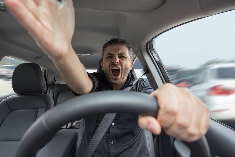 Man Behind The Wheel Shouting And Throwing Hands