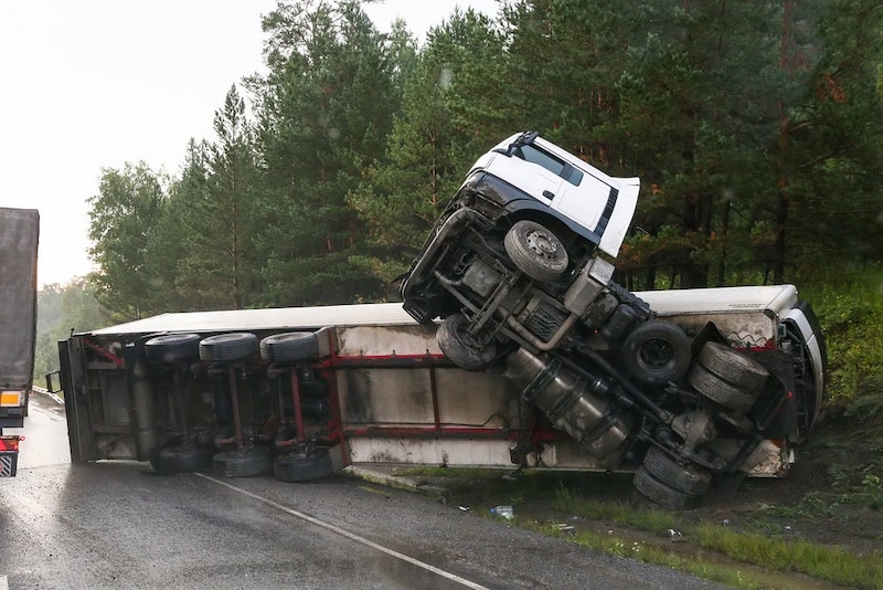 Semi Truck Slipped Off The Road And Fell On Its Side