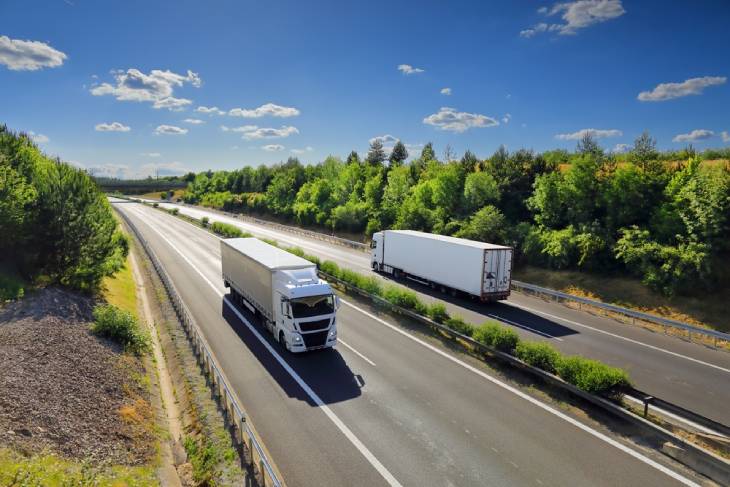 Photo of trucks driving